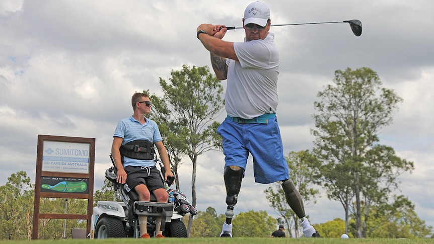 Disability golfer Mathew Forsyth and Ben Tullipan tee off at Parkwood Golf Club