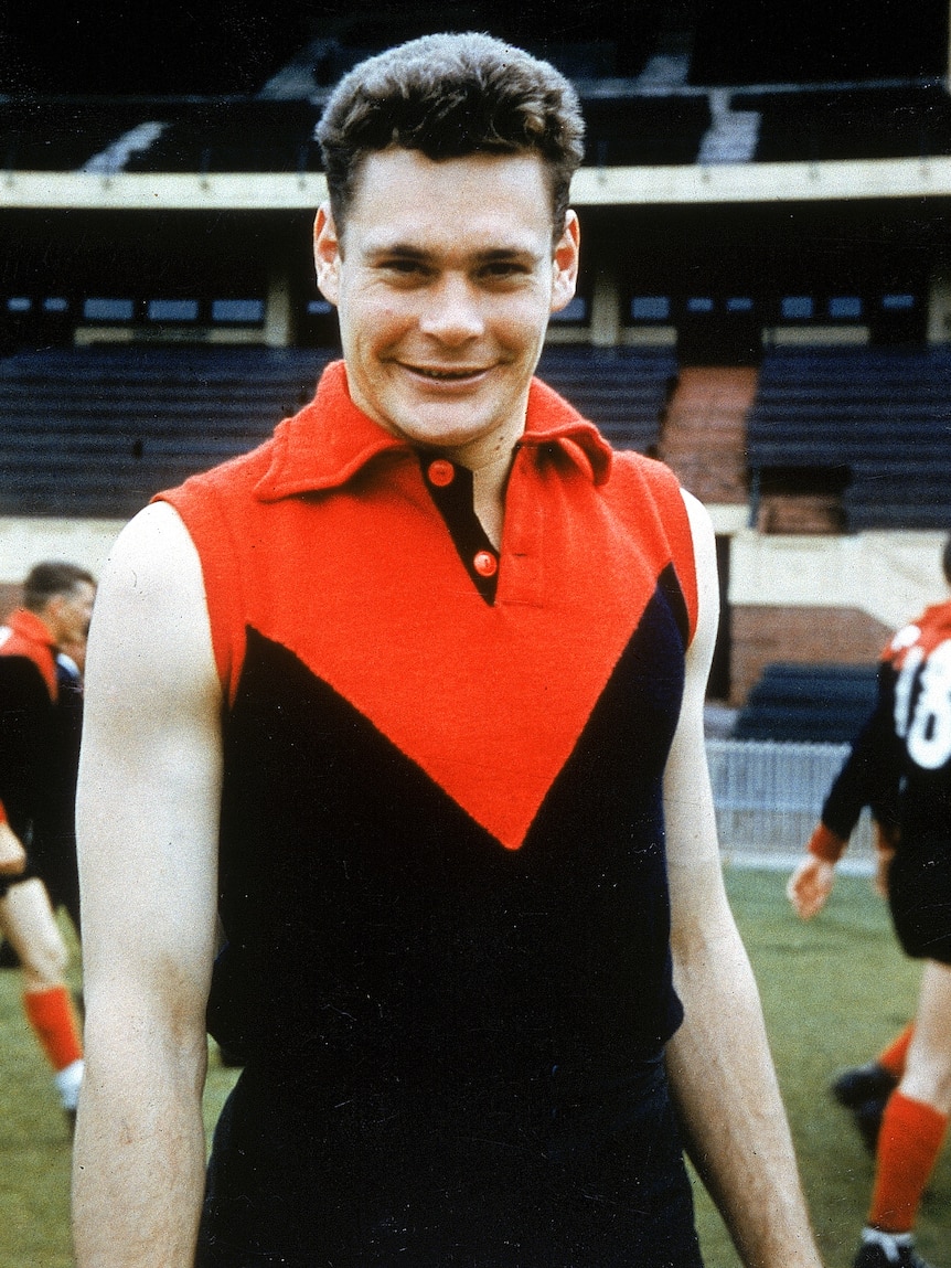 Ron Barassi smiles and looks at the camera