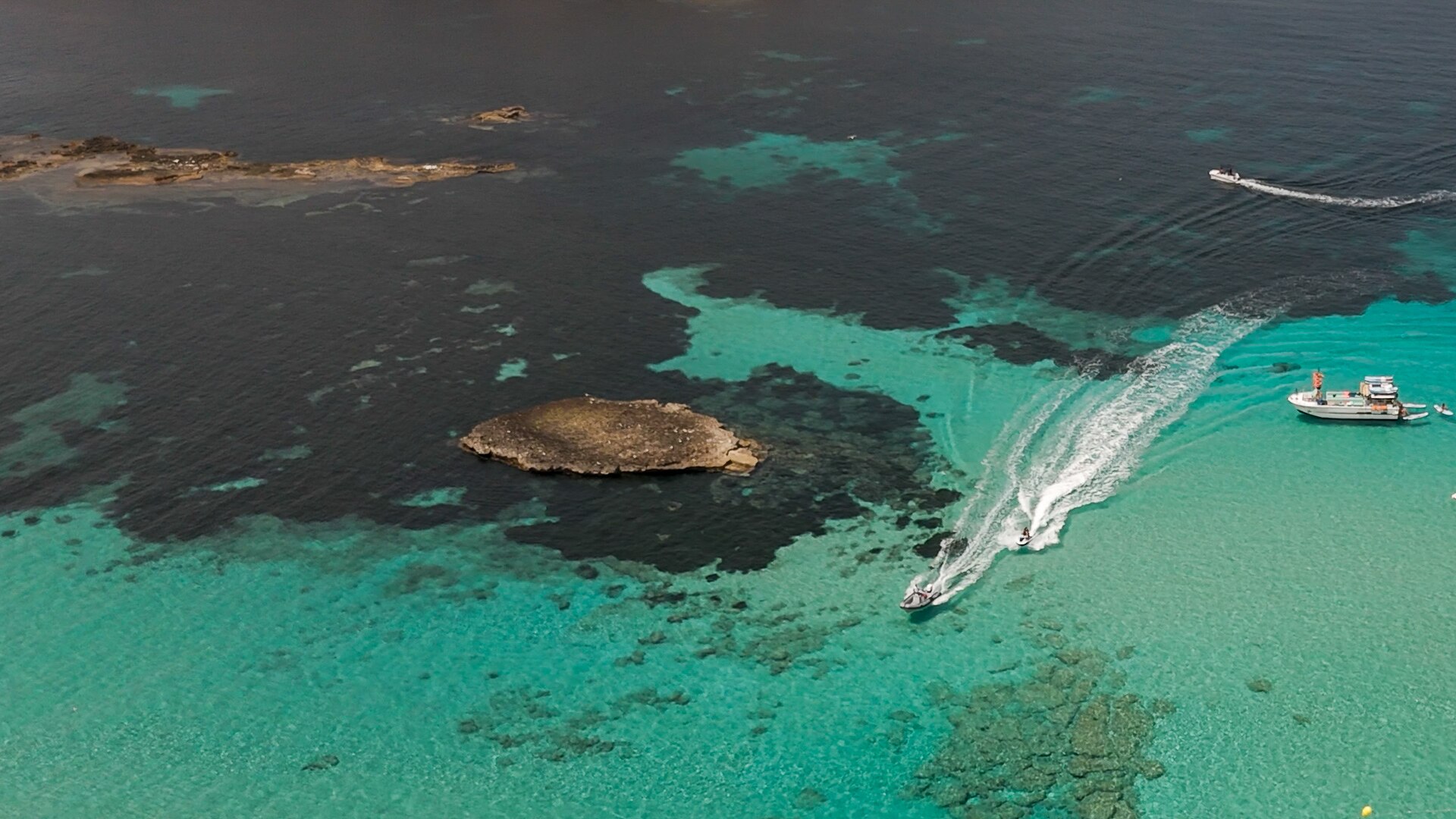 A boat over sea grass.