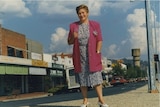 Pam Stone standing with her hand in a jacket pocket along a Wodonga street 