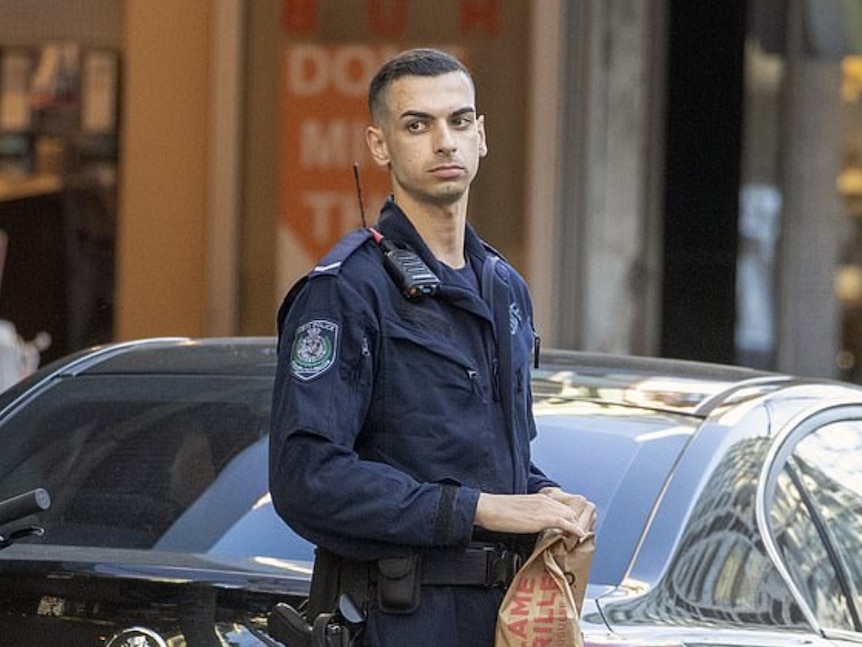 Beau Lamarre in a police uniform