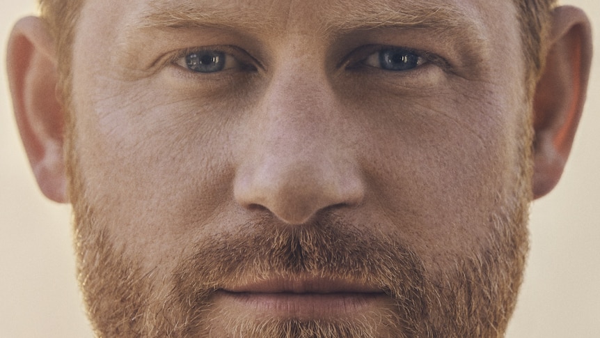 A close-up of Prince Harry's face as it appears on the cover of his book Spare