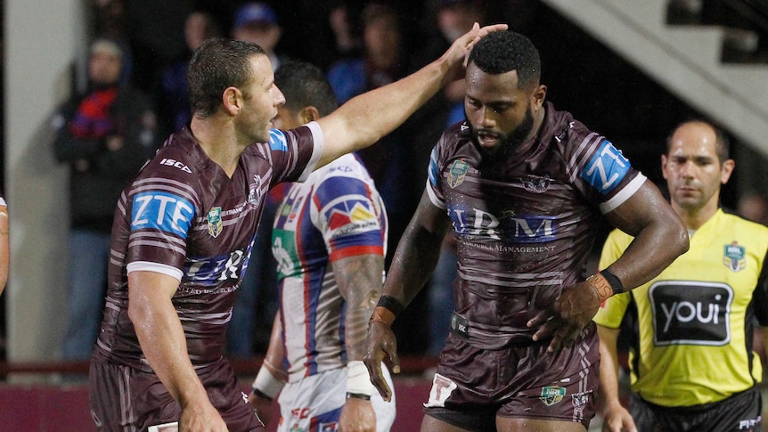 Manly's Akuila Uate celebrates try against Newcastle Knights