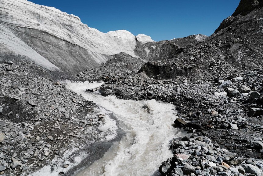 Melt from the glacier cuts a channel through Tiger Valley