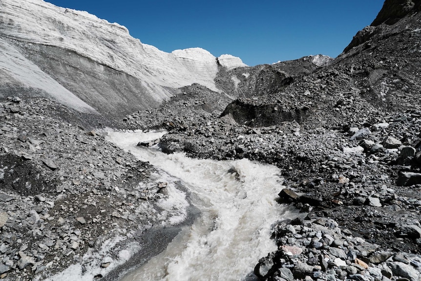 Melt from the glacier cuts a channel through Tiger Valley