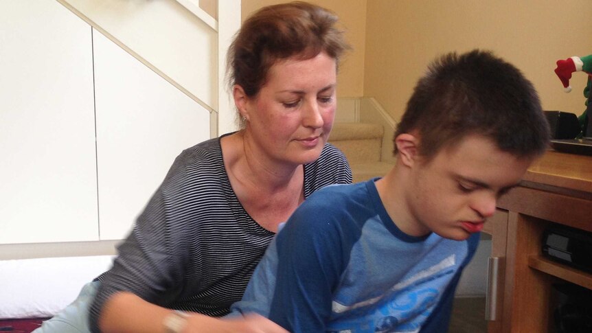 Ronni Wood sits with her disabled son, Matthew.