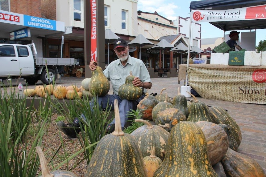 Pumpkin grower Austin Breiner at the Maitland Earth Market