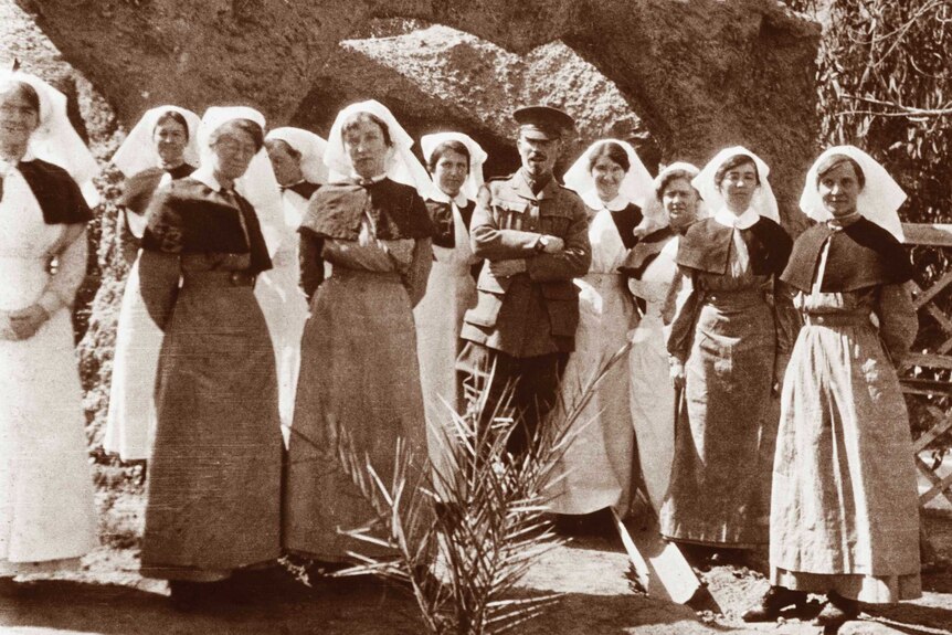 Egypt 1915. A group of unidentified nurses with an officer at Luna Park.