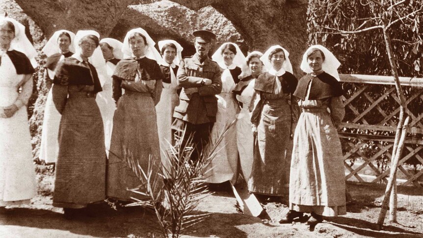 Egypt 1915. A group of unidentified nurses with an officer at Luna Park.