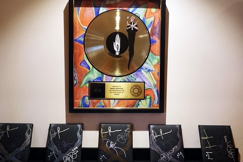 Plaque and five signed CD covers
