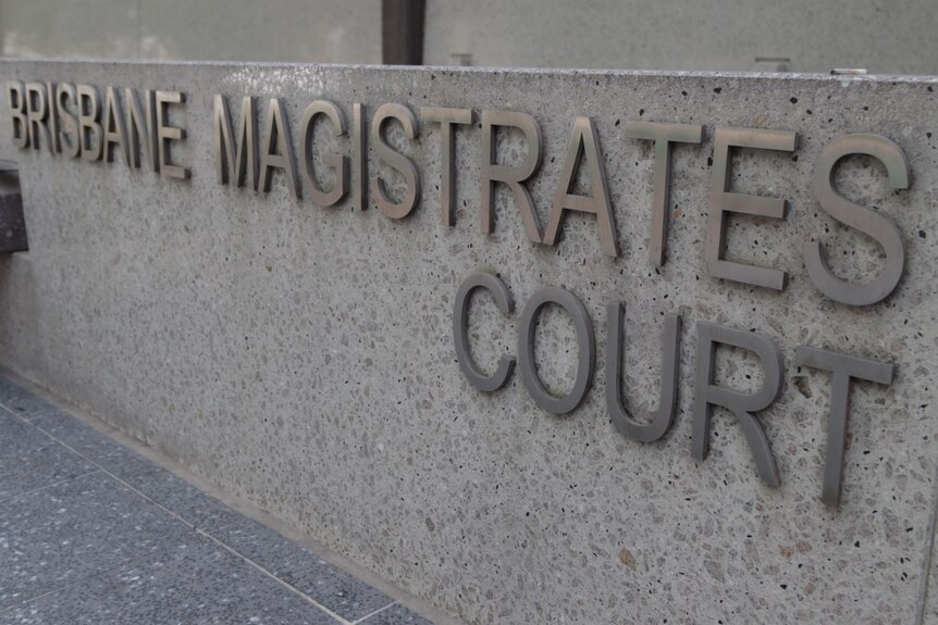 Sign that reads Brisbane Magistrates Court.
