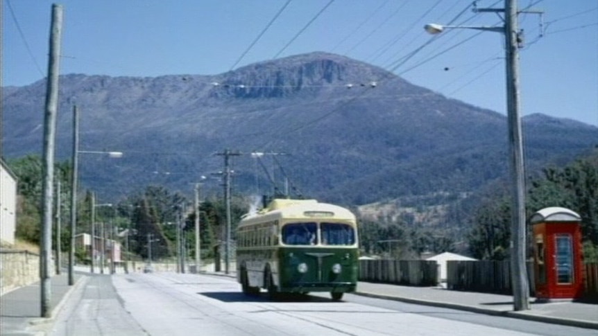 A trolley bus driving through South Hobart in the 1960s.