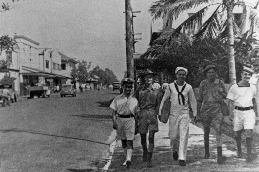 Five men walk down what is now Smith Street Mall