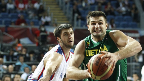 Driving force ... Linas Kleiza takes it to the hole for Lithuania.