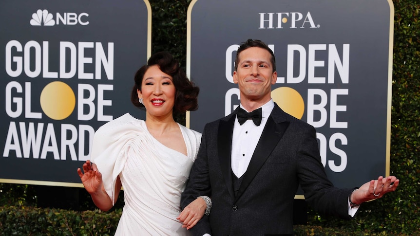 Sandra Oh and Andy Samberg arrive on the Golden Globes red carpet in Beverly Hills, California.