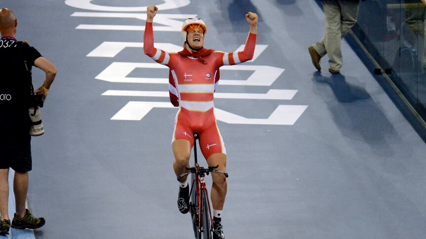 Lasse Norman Hansen celebrates winning the omnium cycling event at the London 2012 Olympic Games.