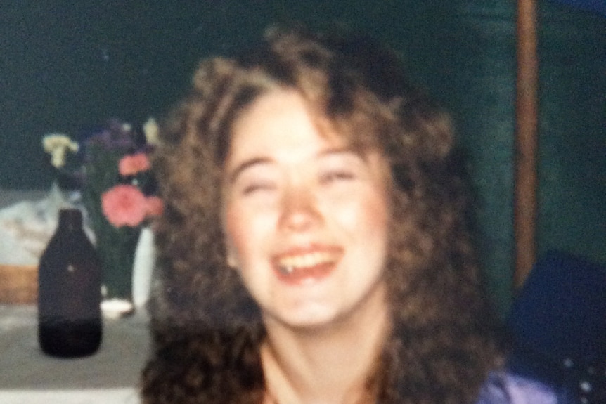 A young woman with long brown hair