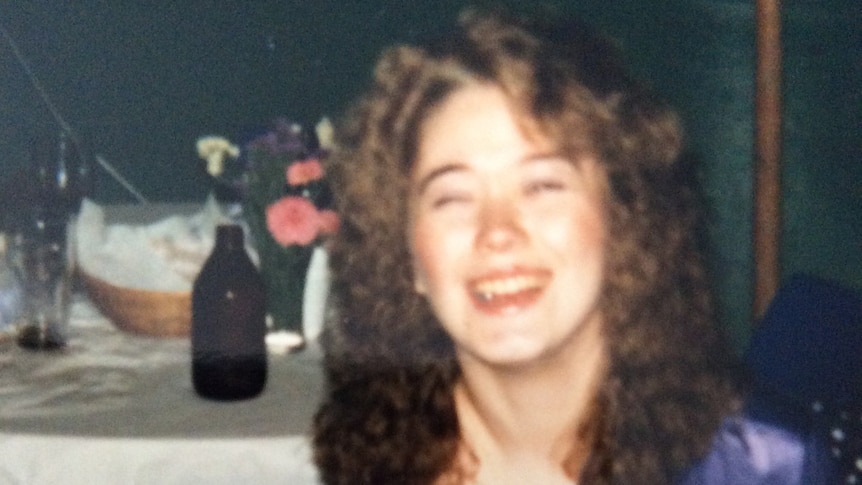 A young woman with long brown hair