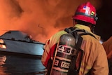 Firefighters respond to a boat fire off the coast of southern California,