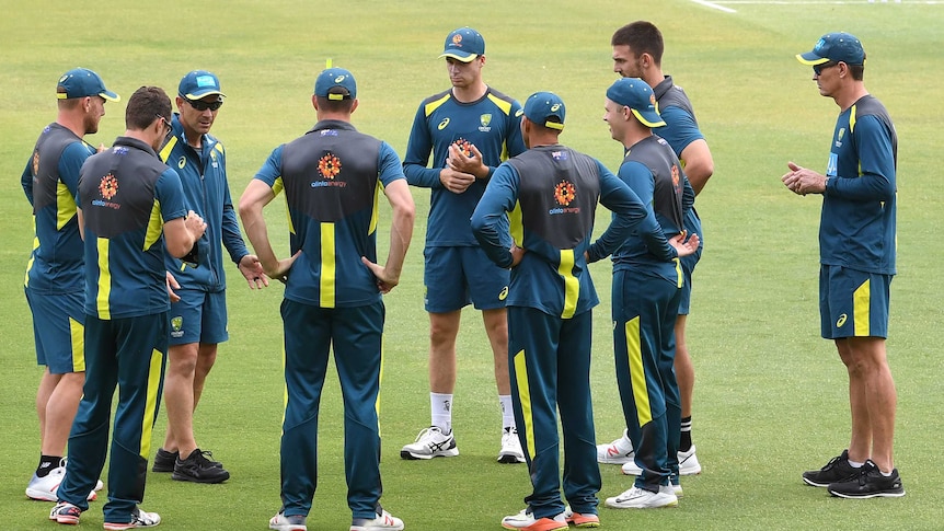 Cricket coach, Justin Langer, speaks to the Australian Test players during a training session