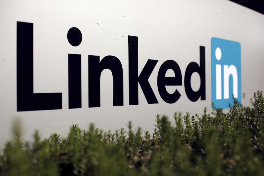 A photo of the LinkedIn logo with green grass underneath.