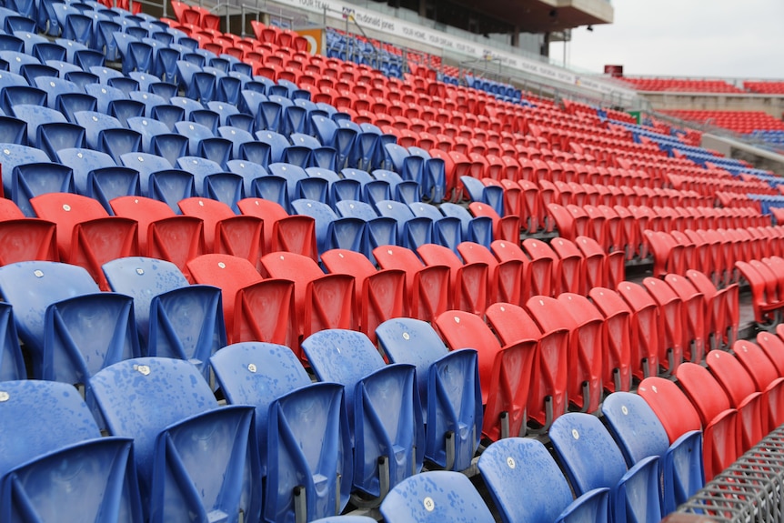 empty red and blue stadium seats