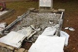 Fourteen headstones in the St John's cemetery have been damaged by vandals.