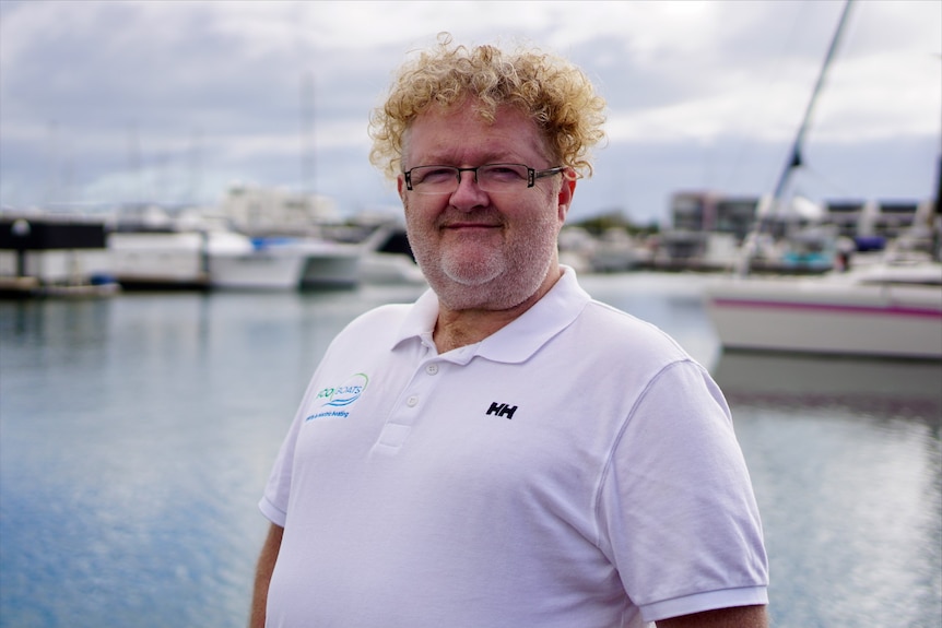 Gerd Heinen stands in front of Mandurah marina