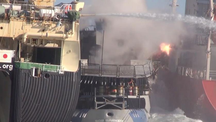 concussion grenade from the Nisshin Maru explodes on the fuel tanker Sun Laurel, a vessel so combustible that smoking is not permitted on the ship. Also visible on the Bob Barker's deck are barrels of unleaded petrol and aviation turbine fuel