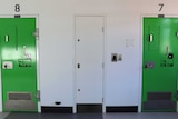 Green cell doors in the Special Care Unit at the Alexander Maconochie Centre.