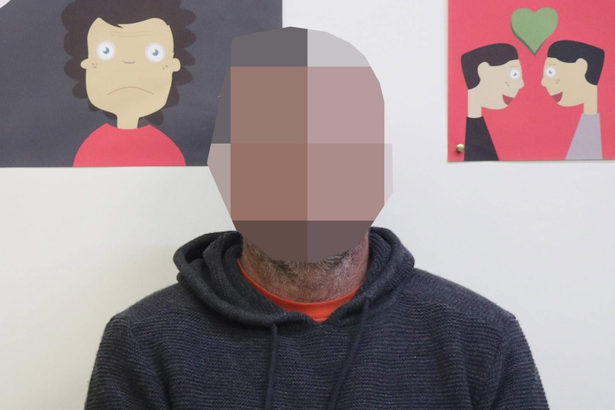 A man (face pixellated) who took part in a behavioural change program