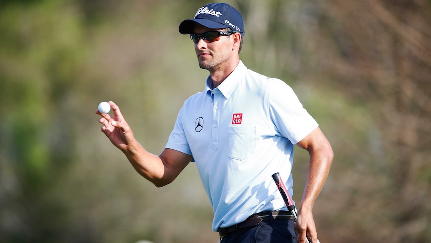 Australia's Adam Scott waves on the 17th green during the second round at Bay Hill.