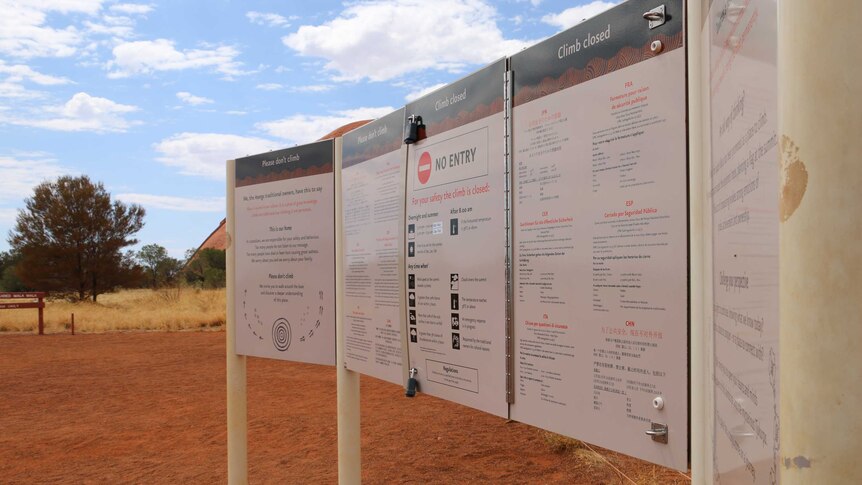 Signage at the base of Uluru