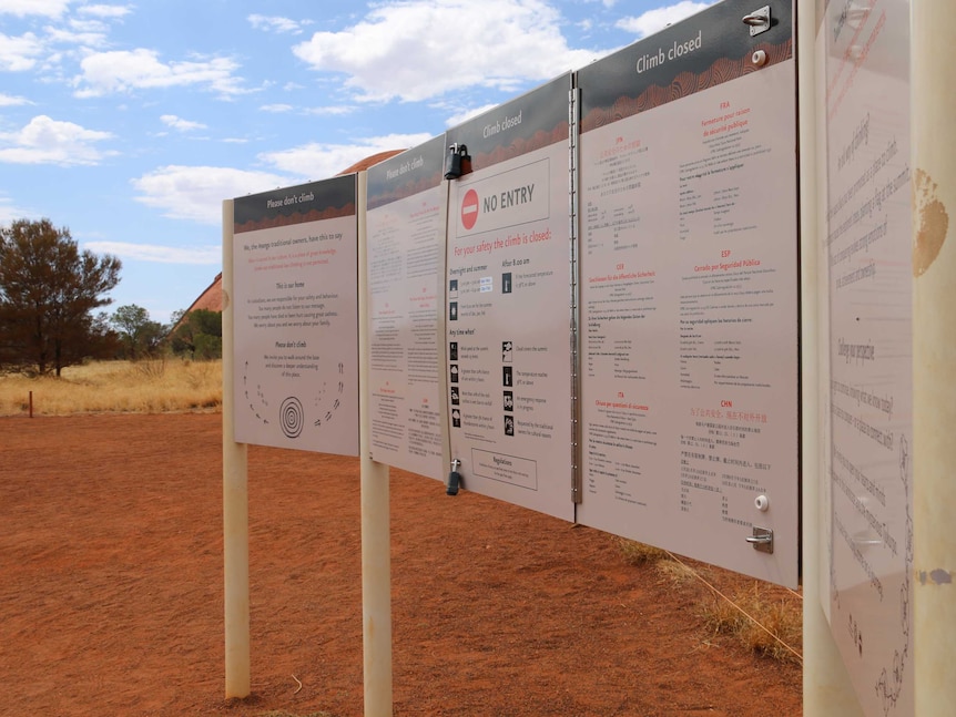 Signage at the base of Uluru