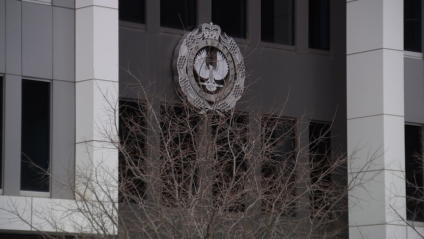 A building with a piping shrike logo on it