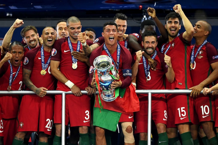 Cristiano Ronaldo lifts the Euro trophy