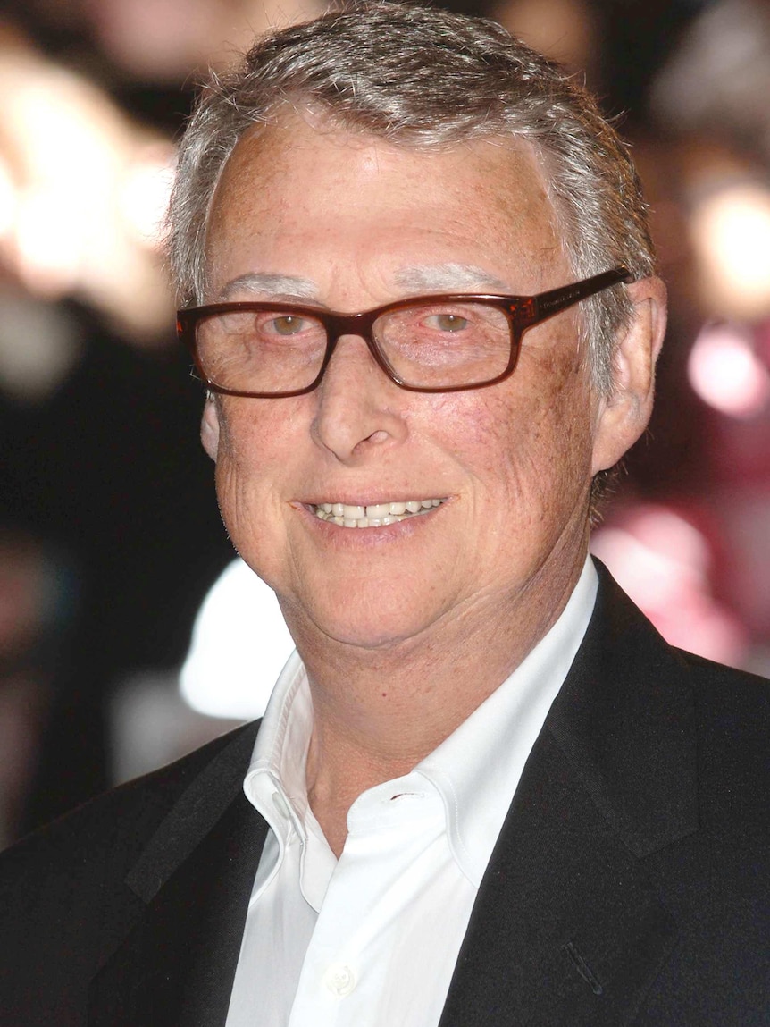 Director Mike Nichols poses for photographers at the premiere of "Charlie Wilson's War" in London January 9, 2008.