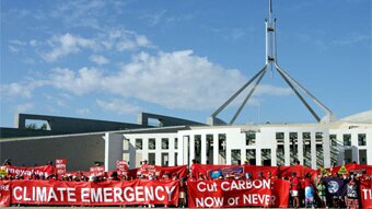 Climate change protesters surround Parliament House in Canberra (Damien Larkins/ABC News)