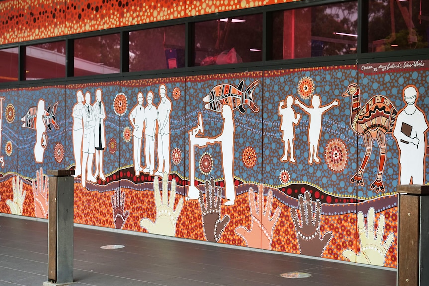 A mural of hospital workers