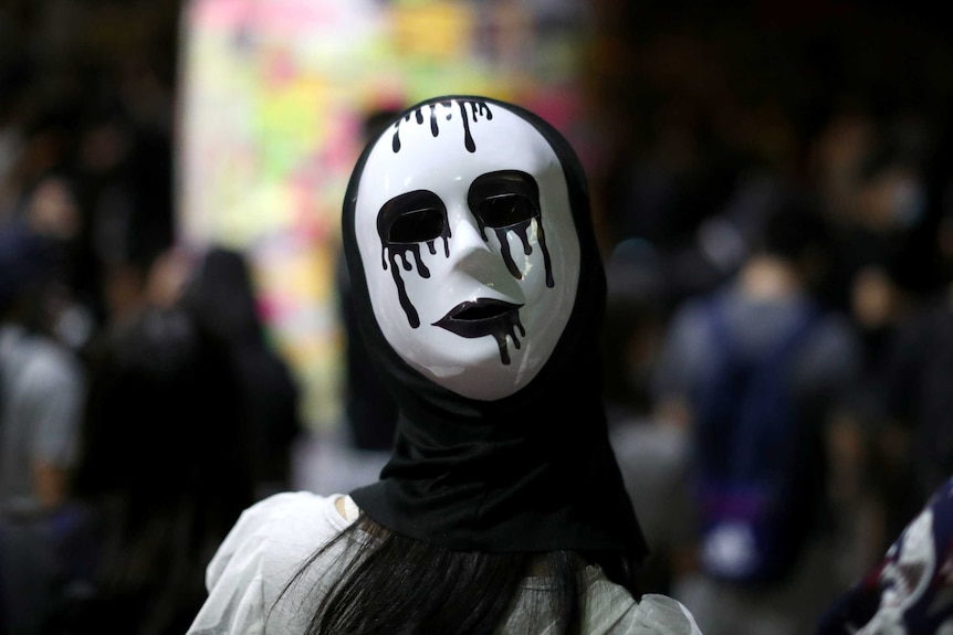 An anti-government protester wears a mask during a demonstration in Hong Kong.