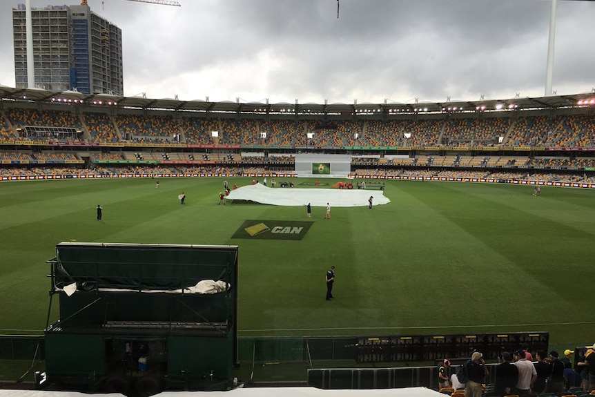 Covers come on at the Gabba