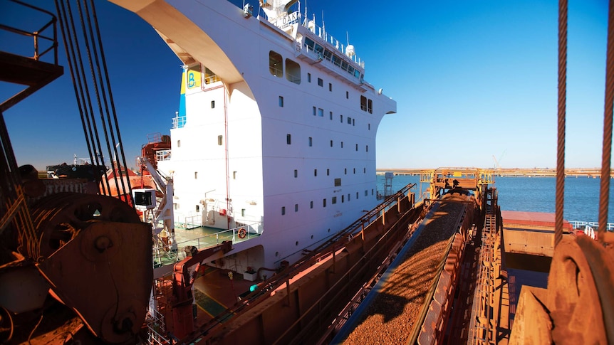 Iron ore being loaded onto a ship in Port Hedland