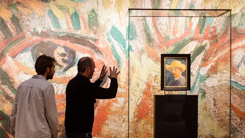 Colour still of director David Bickerstaff at the Van Gogh Museum in 2015 documentary Vincent Van Gogh: A New Way of Seeing.