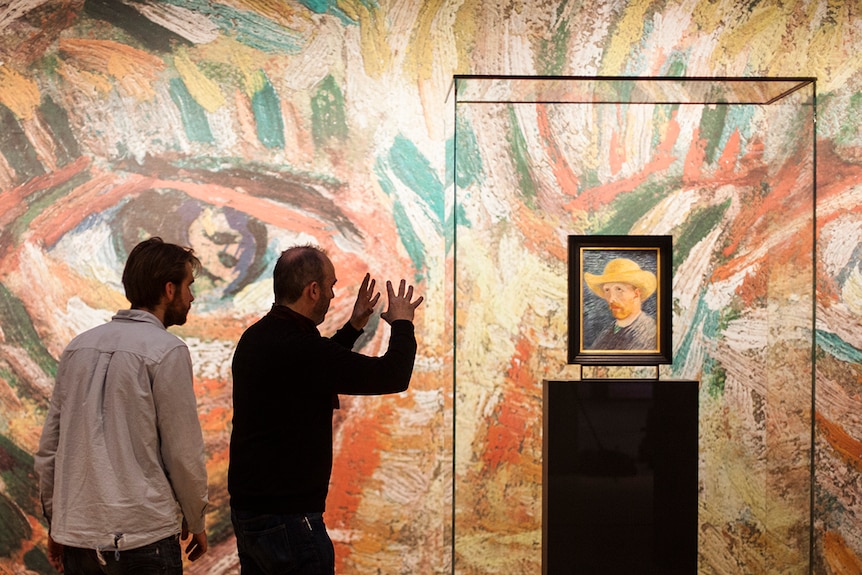 Colour still of director David Bickerstaff at the Van Gogh Museum in 2015 documentary Vincent Van Gogh: A New Way of Seeing.