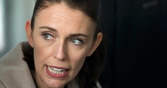 Jacinda Ardern looks uncomfortable as she speaks at a media event