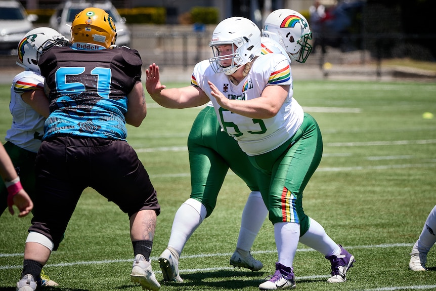 A UNSW Raiders player defends