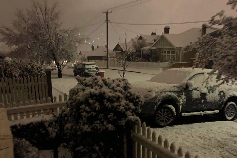 Snow covers a street in East Launceston, August 2020.