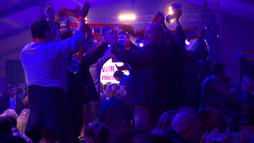 Supporters of Austria's Freedom Party celebrate after their strong showing in Vienna's mayoral elections.