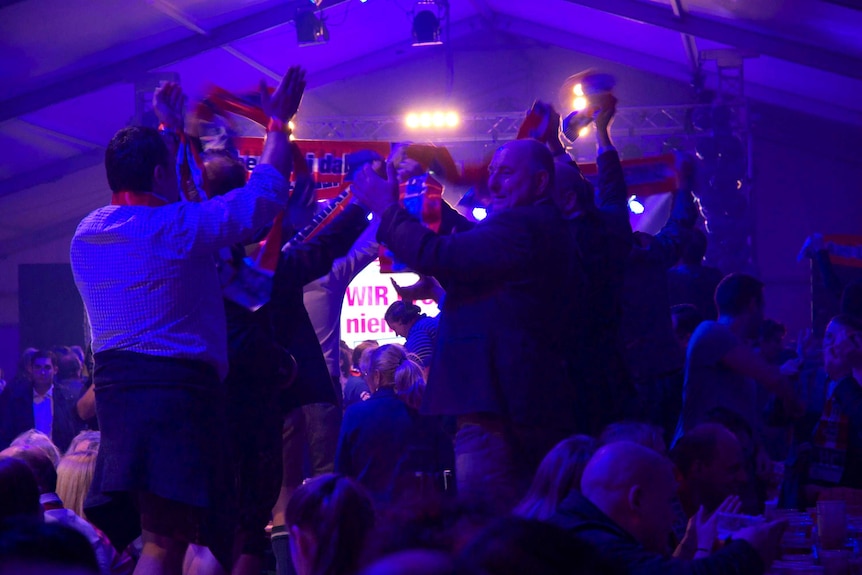 Supporters of Austria's Freedom Party celebrate after their strong showing in Vienna's mayoral elections.