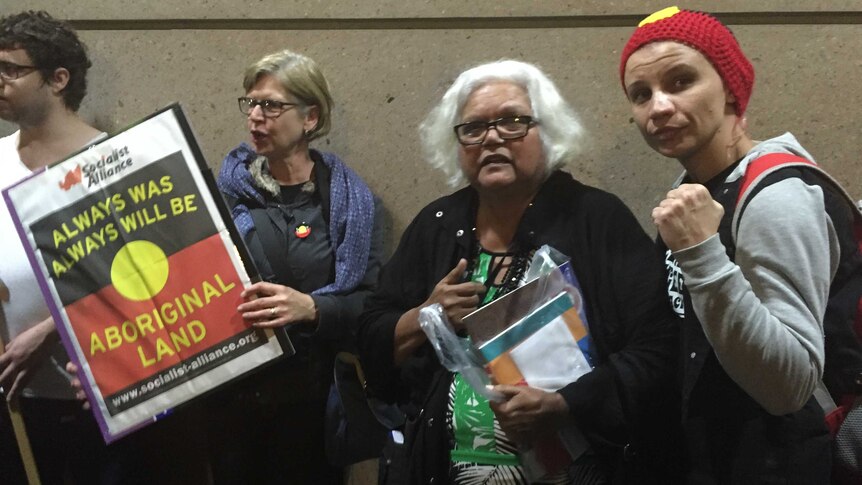 Aboriginal leader Aunty Shirley and fellow protesters at a protest in front of the ABC.